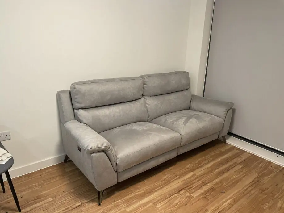 CONTEMPO COLLECTION FROM FURNITURE VILLAGE ELECTRIC RECLINER 3 SEATER SOFA IN LIGHT GREY SADDLE FABRIC