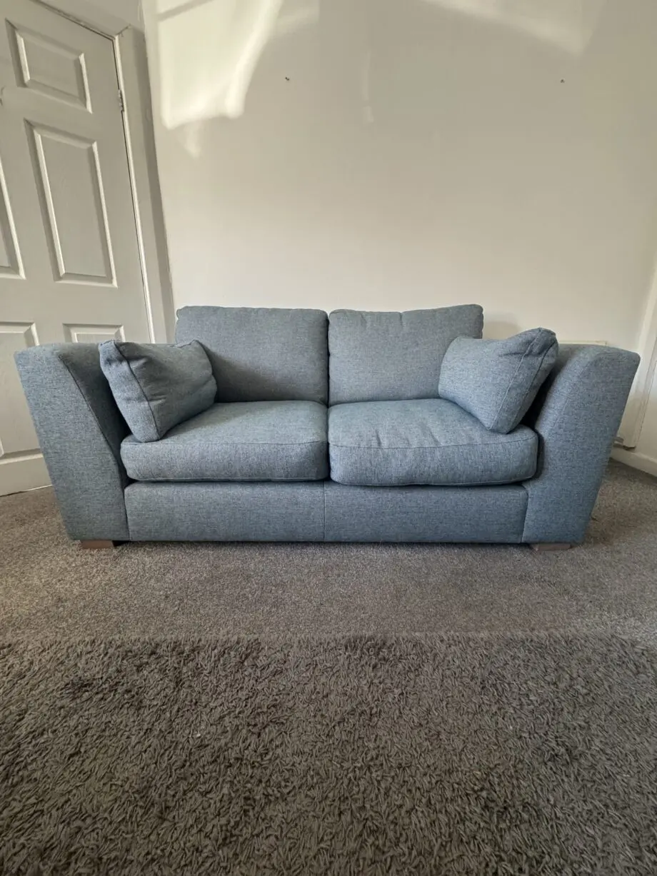 Unused M&S Large 2 seater blue sofa in brand new condition. This is the best quality and best priced sofa on this whole site and is being removed from sale after this final reduction.