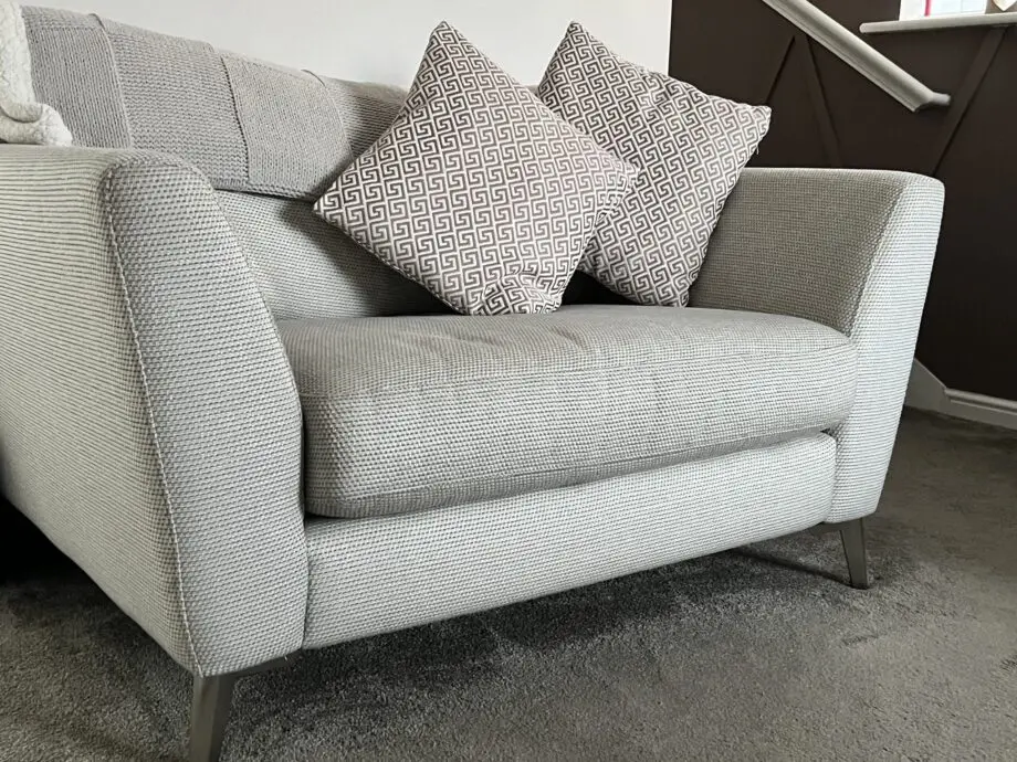 3 seater sofa and cuddle chair, from DFS and brand is house beautiful, name-Libby and colour is Silver combination
