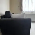 Charcoal two seater sofas