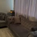 Grey velvet sofa