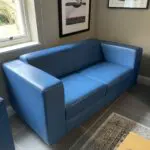Boss Design 2 seater blue leather sofa. 2 of 2 - will split.