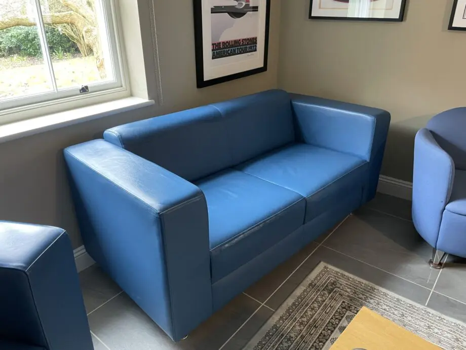 Boss Design 2 seater blue leather sofa. 2 of 2 - will split.