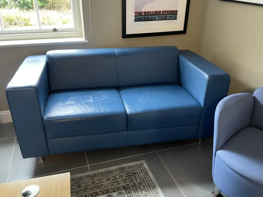 Boss Design 2 seater blue leather sofa. 2 of 2 - will split.