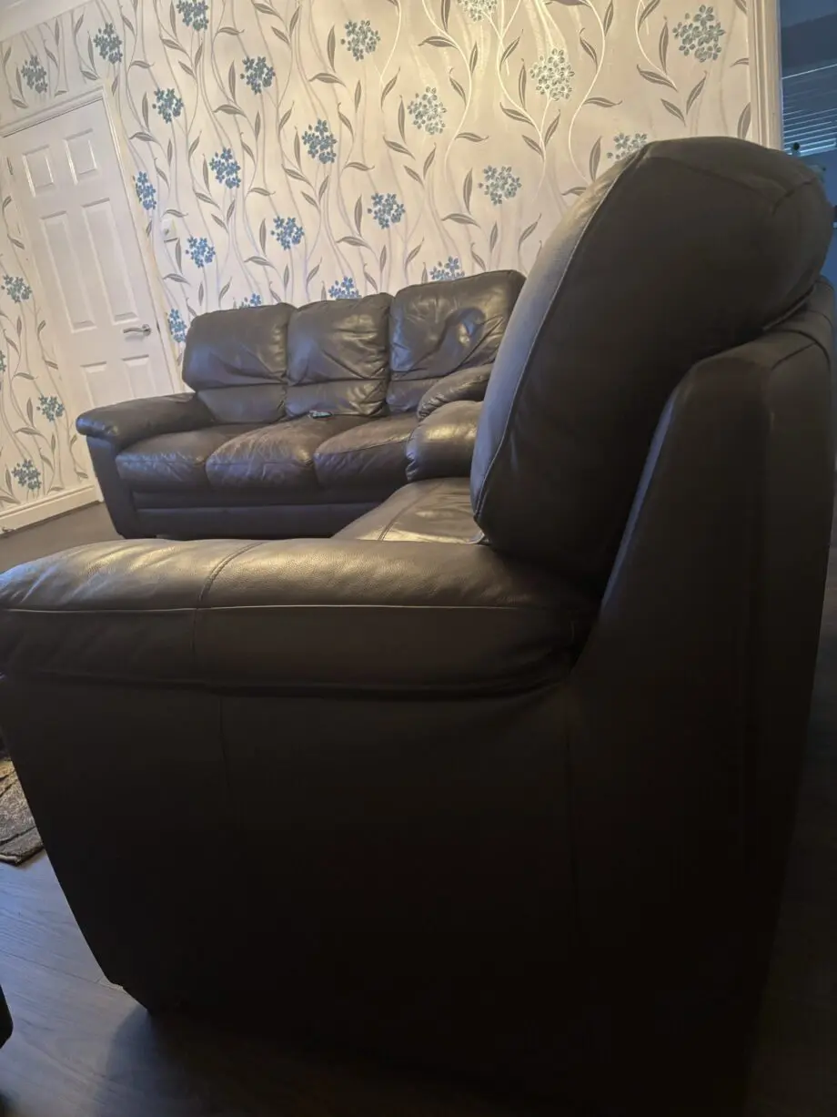 Brown leather sofa and foot stool