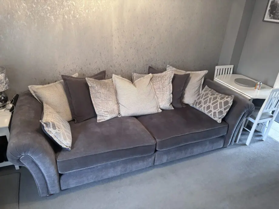 Grey sofa with scatter cushions