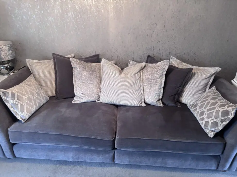 Grey sofa with scatter cushions