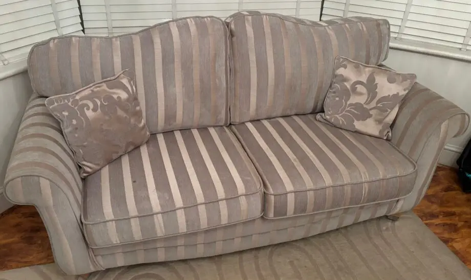 High back gold/grey sofas