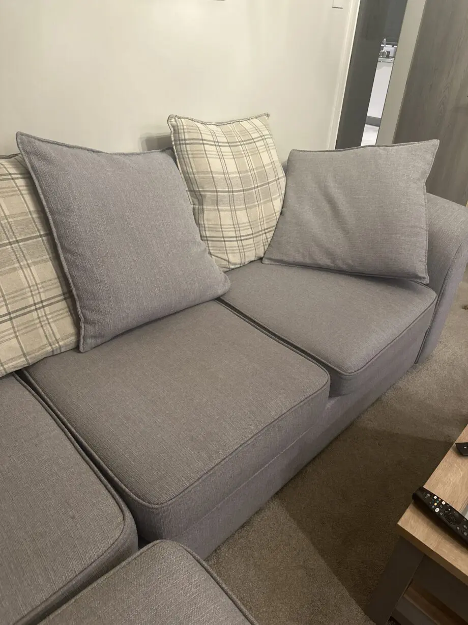 L - Shape Sofa (grey) + swivel chair and pouffe.