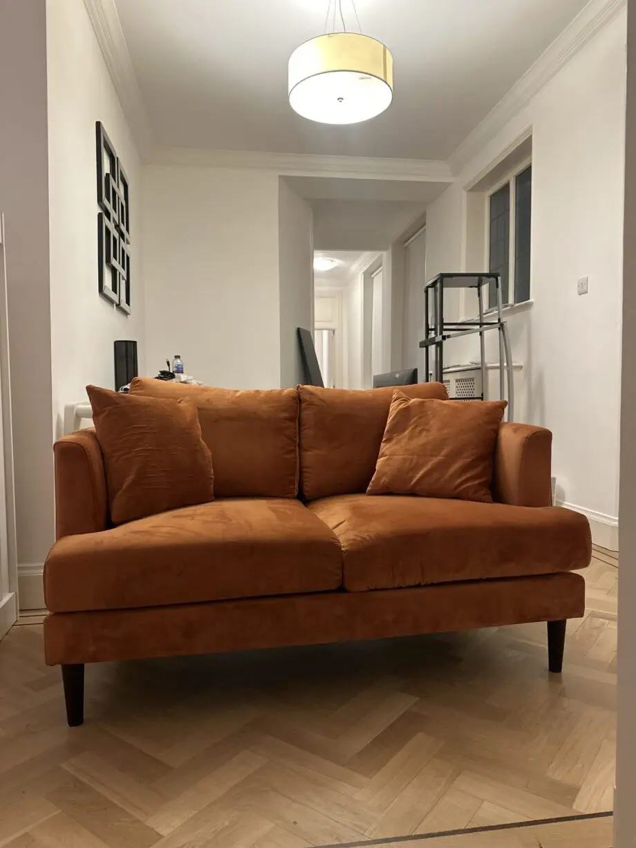 DEBENHAMS ORANGE NEW SOFA