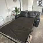Black faux fur sofa