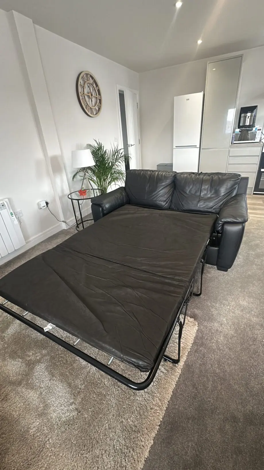 Black faux fur sofa