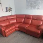 Red double reclining corner sofa