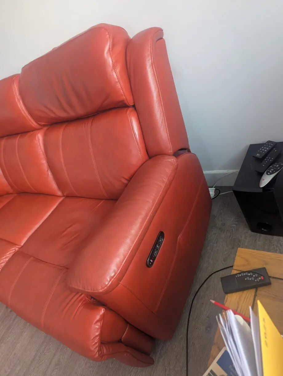 Red double reclining corner sofa