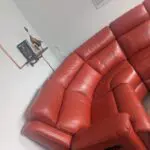 Red double reclining corner sofa