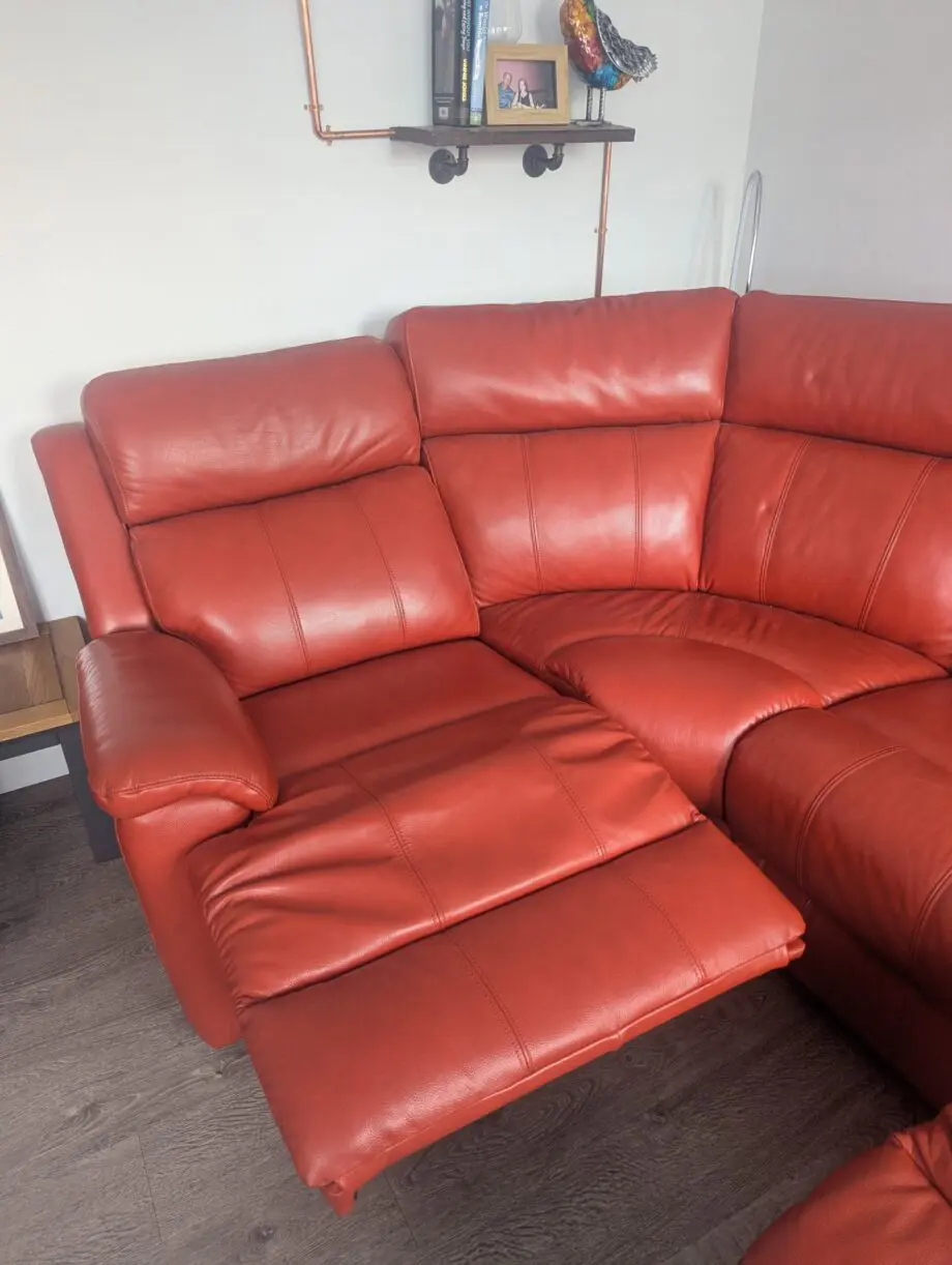 Red double reclining corner sofa
