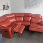 Red double reclining corner sofa