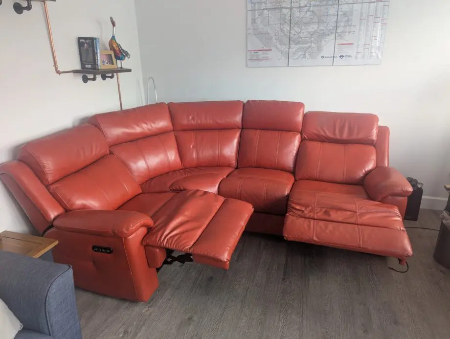Red double reclining corner sofa