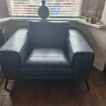 DFS navy leather corner sofa and chair
