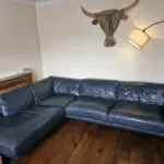 DFS navy leather corner sofa and chair