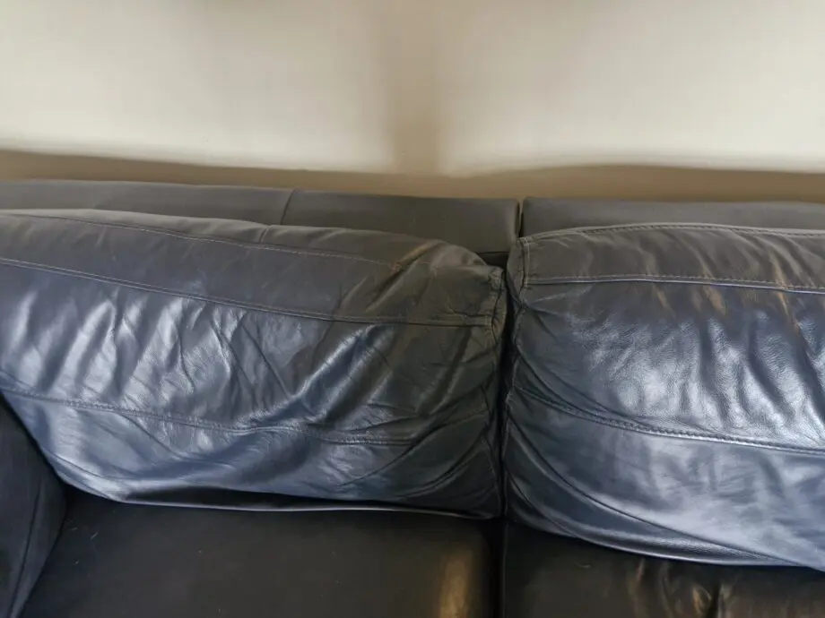 DFS navy leather corner sofa and chair
