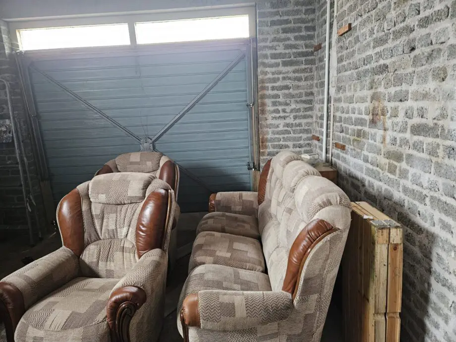 Beige and brown leather patch sofa