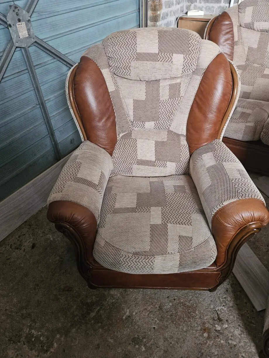 Beige and brown leather patch sofa