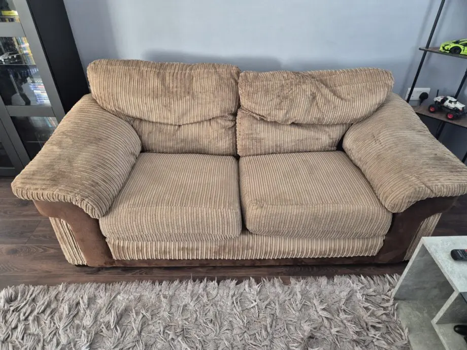 Brown two seater sofa