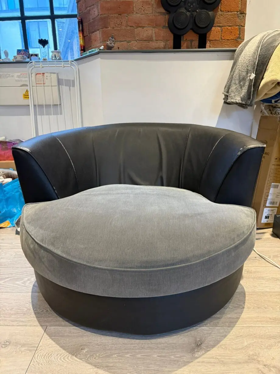 Grey and black cuddling sofa