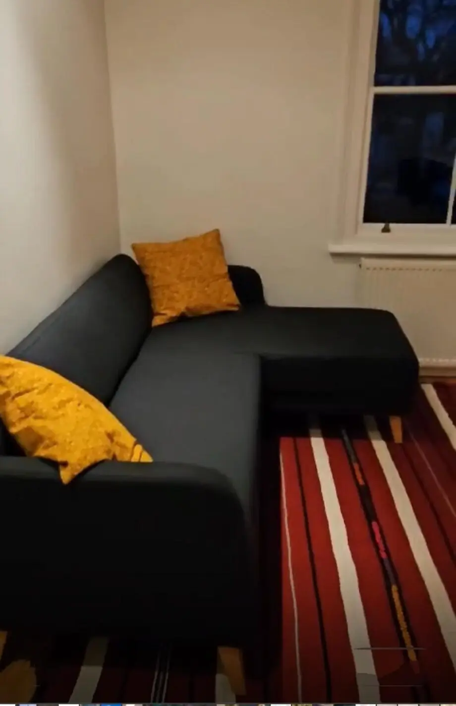 Dark grey corner sofa