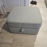 3 seater mint green DFS sofa with matching ottoman footstool
