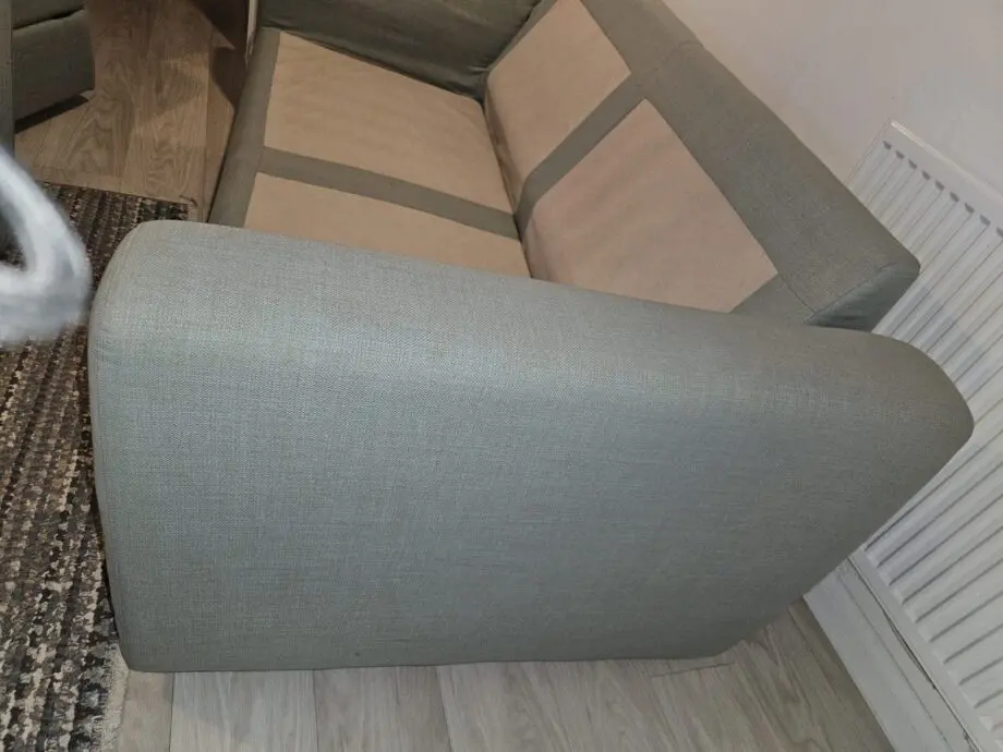 3 seater mint green DFS sofa with matching ottoman footstool