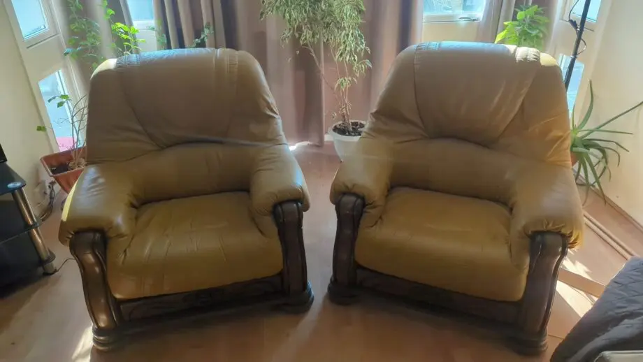 2 solid oak leather armchairs with