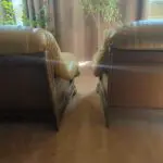 2 solid oak leather armchairs with