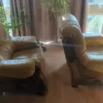 2 solid oak leather armchairs with