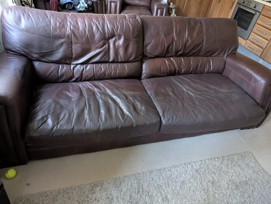 Brown leather 4 seater sofa and 2 chairs