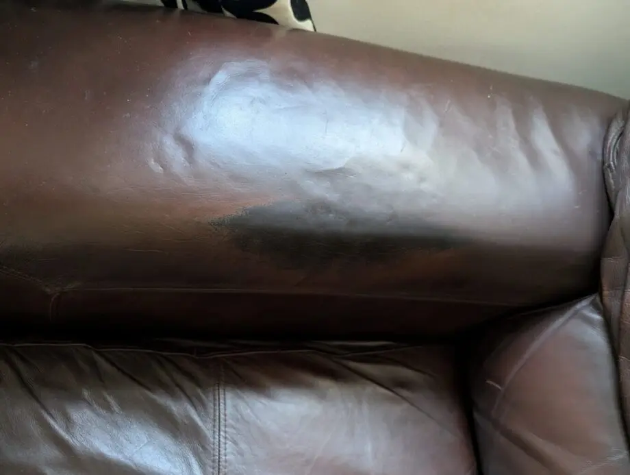 Brown leather 4 seater sofa and 2 chairs