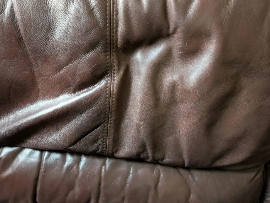 Brown leather 4 seater sofa and 2 chairs