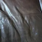Brown leather 4 seater sofa and 2 chairs