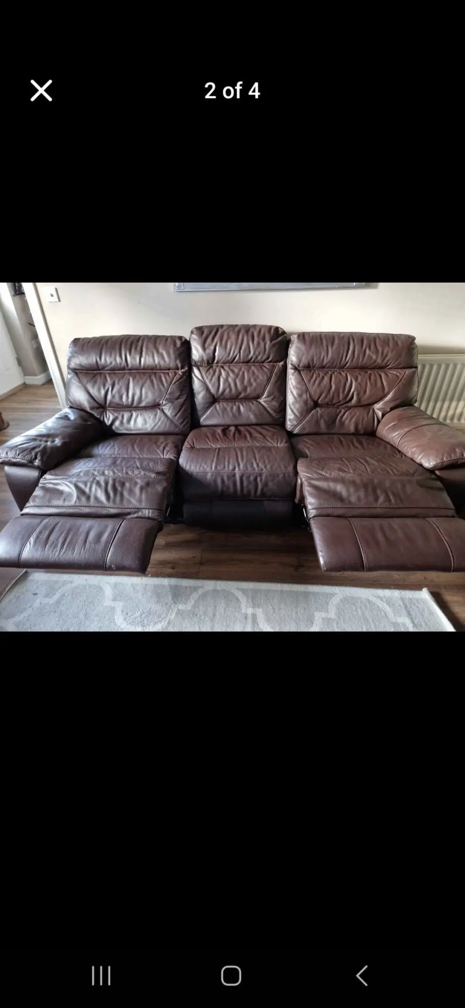 DFS Dark brown leather sofa double recliner