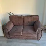 Two seater sofa brown colour