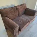 Two seater sofa brown colour