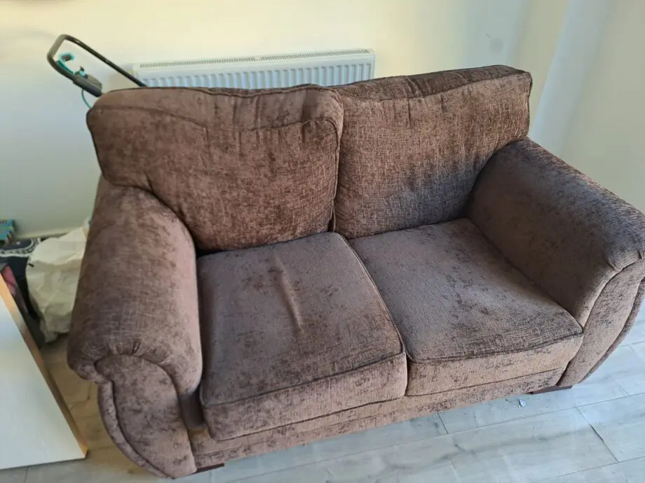 Two seater sofa brown colour
