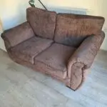 Two seater sofa brown colour