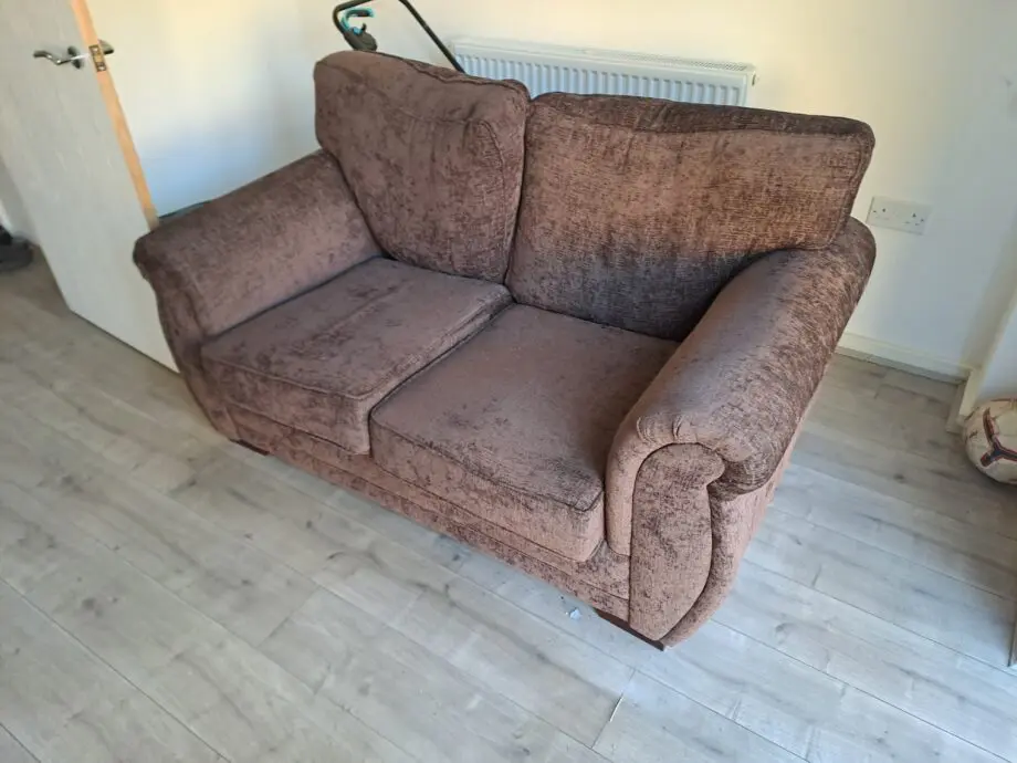Two seater sofa brown colour
