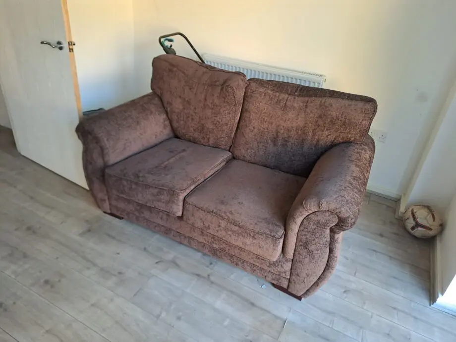 Two seater sofa brown colour