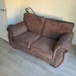 Two seater sofa brown colour