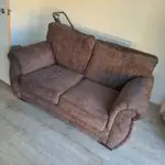 Two seater sofa brown colour