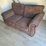 Two seater sofa brown colour