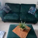 Brand new DFS sofas for sale premium quality barley used in a excellent condition gorgeous green sofas and 1 seater sofa which is brown with a little green table of the set